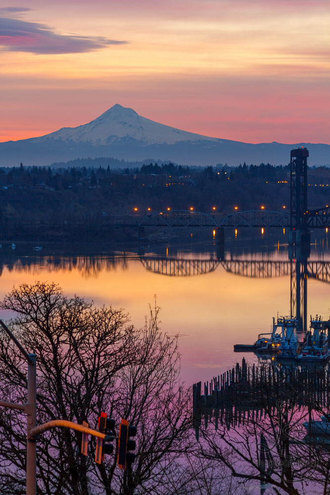 The Willamette River gently wakes up in the shadow of Mount Hood.