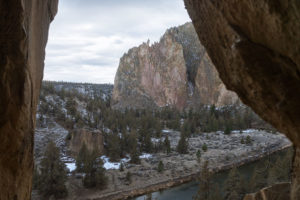 Looking out at Smith Rock from within a rocky alcove | LotsaSmiles Photography